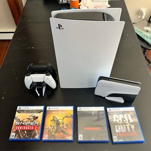 Playstation 5 with games, used once